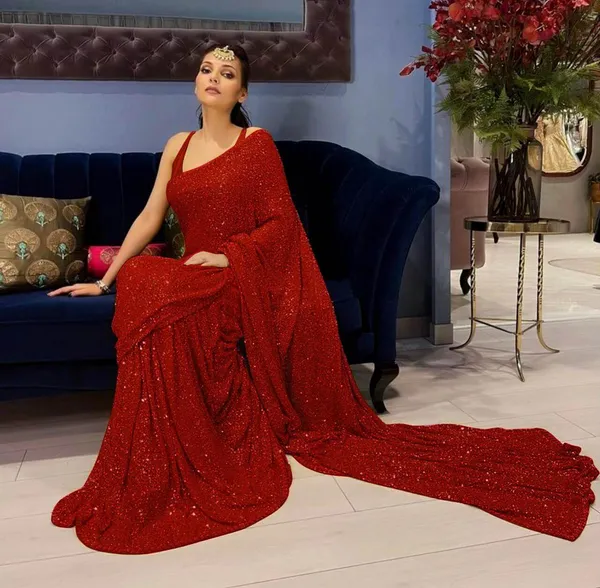 https://d1311wbk6unapo.cloudfront.net/NushopCatalogue/tr:f-webp,w-600,fo-auto/Aika Women Red Colored Georgette With Fancy Squence Work Saree BT-255-E_C30Z3D7ZFF_2022-03-11_1.jpg__Aika Fashion